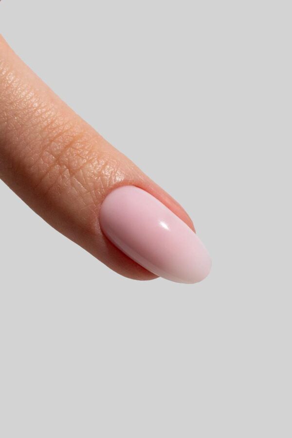 Photo de la hard gel pink in the bottle de chez musa nails. De couleur rose laiteux.