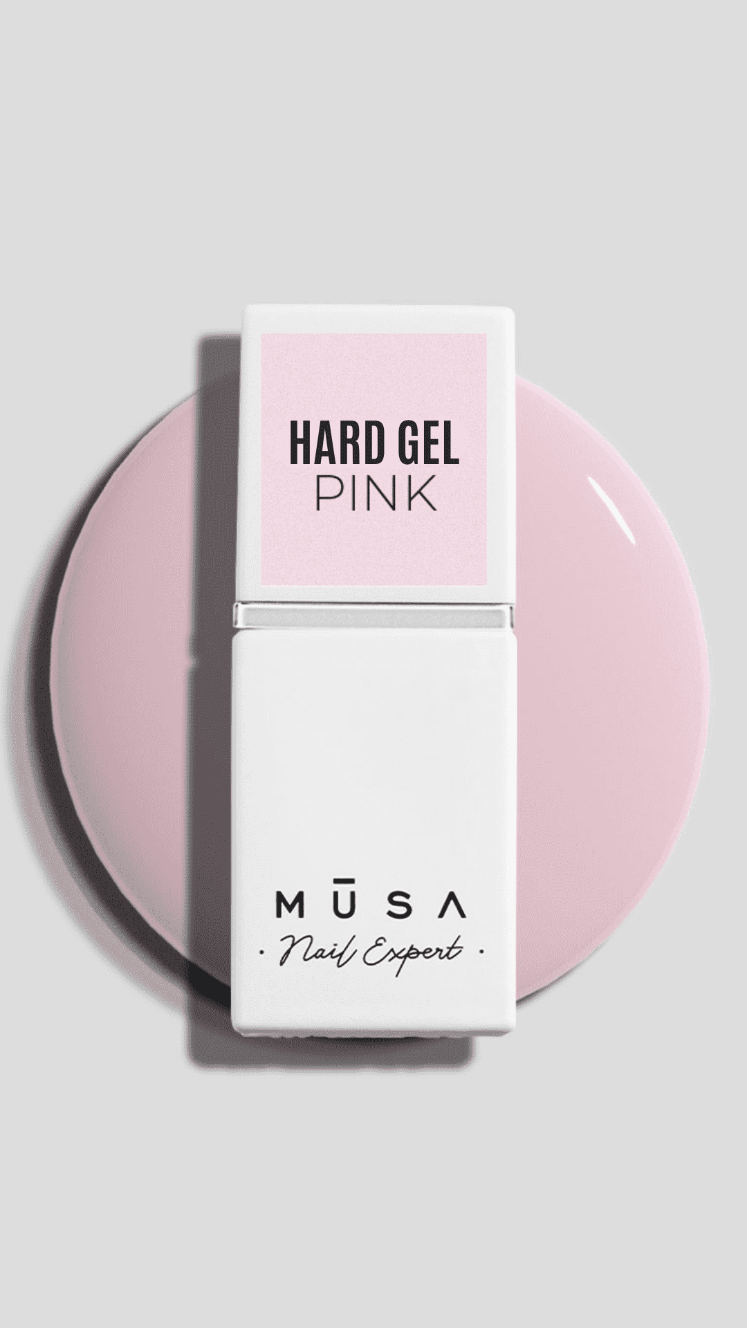 Photo de la hard gel pink in the bottle de chez musa nails. De couleur rose laiteux.